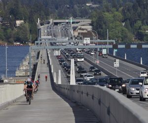 "SR 520 Floating Bridge bike trail" by SounderBruce is licensed under CC BY-SA 2.0.